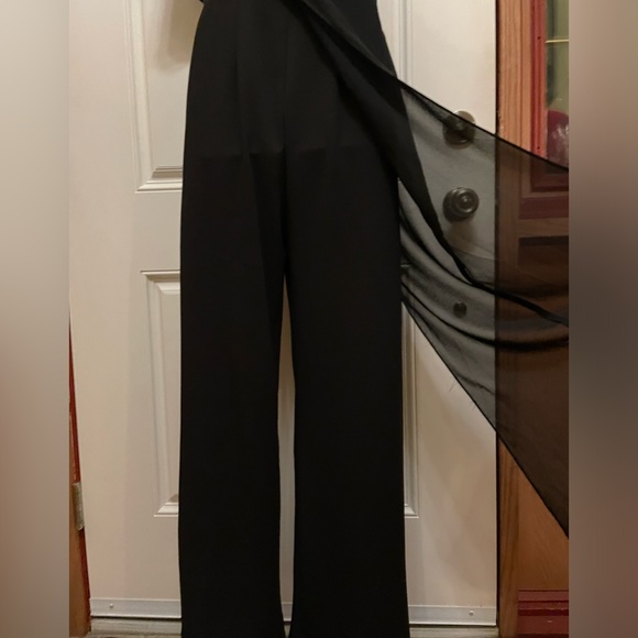 Le chateau one Shoulder black Jumpsuit with a black sheer overlay. Very Elegant - Picture 4 of 14